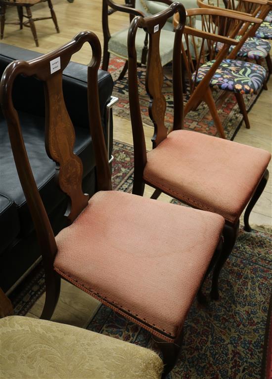 A pair of Edwardian inlaid mahogany salon chairs